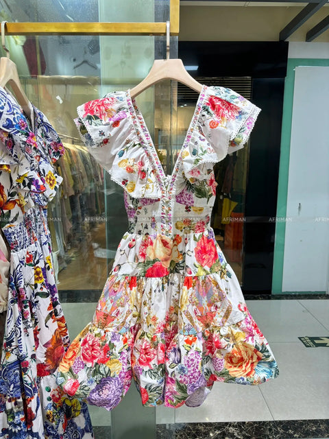 2024 New V Neck Heavy Beaded Flying Sleeve Flower Print Elastic Waist Backless Bow Decoration Big Swing Short Dress - Dresses - Sharon Tatem LLC.